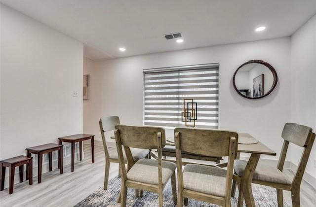 dining area featuring light hardwood / wood-style floors