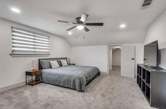 carpeted bedroom featuring ceiling fan and lofted ceiling