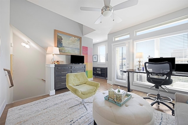 interior space with hardwood / wood-style flooring and ceiling fan