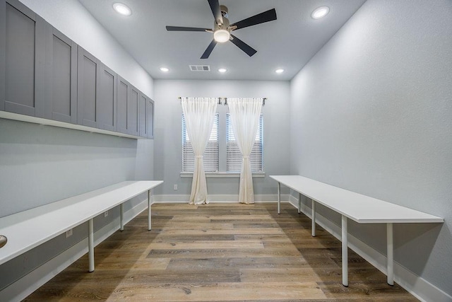 interior space featuring light wood-type flooring and ceiling fan