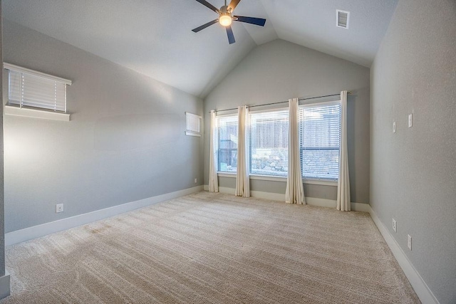 unfurnished room with ceiling fan, light carpet, and lofted ceiling