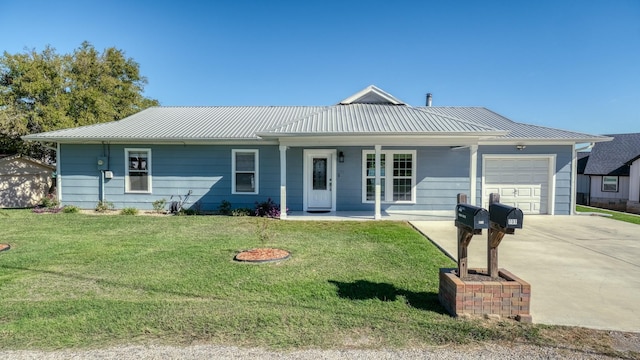 ranch-style home with covered porch, a garage, and a front lawn