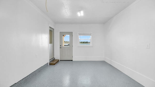 unfurnished room featuring ornamental molding