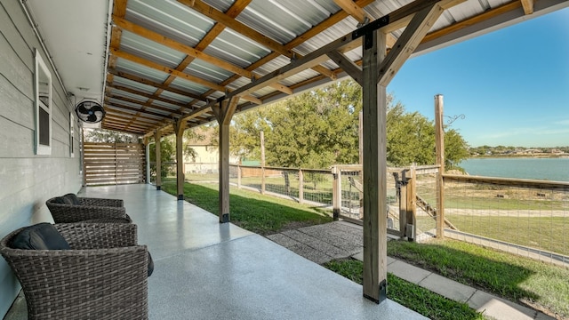 view of patio / terrace with a water view