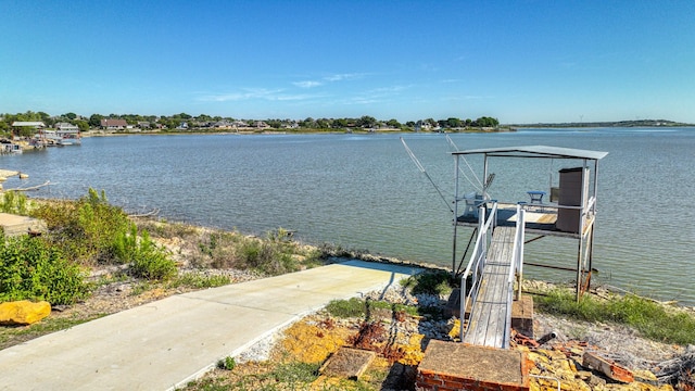 view of water feature with a dock