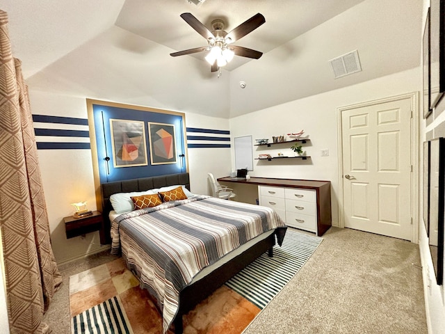 carpeted bedroom with lofted ceiling and ceiling fan