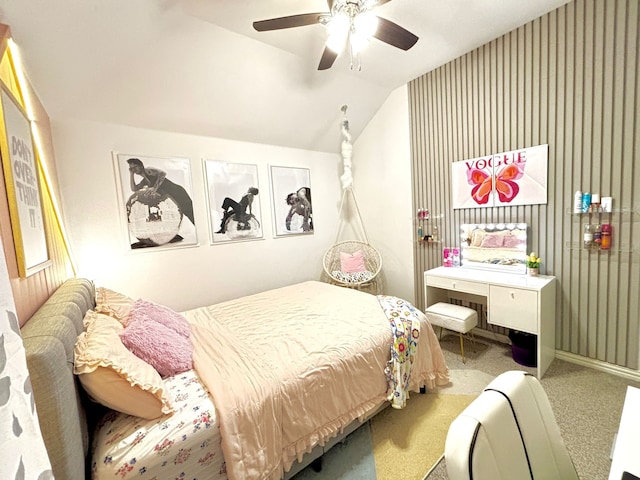 bedroom featuring vaulted ceiling, carpet floors, and ceiling fan