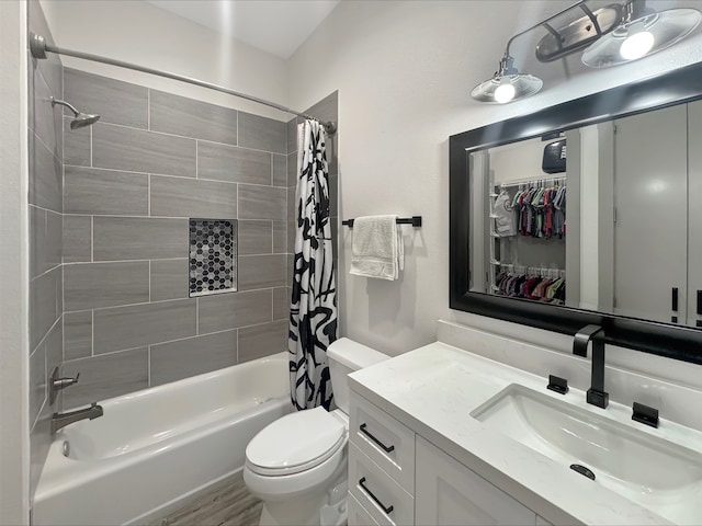 full bathroom featuring toilet, shower / bathtub combination with curtain, and vanity