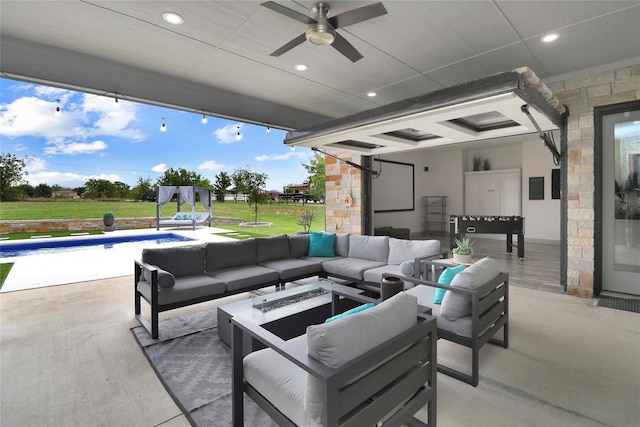 view of patio featuring an outdoor hangout area and ceiling fan