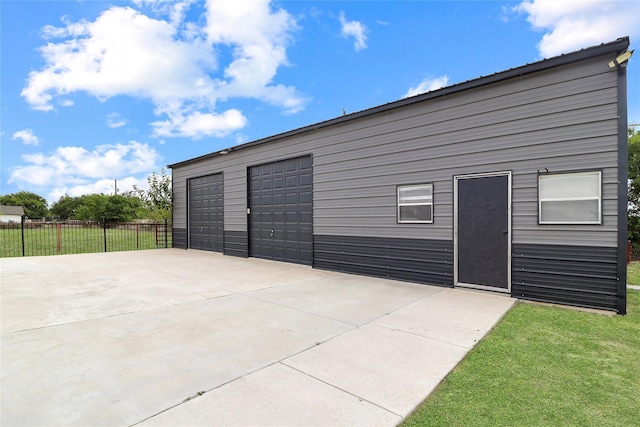 view of outdoor structure with a garage