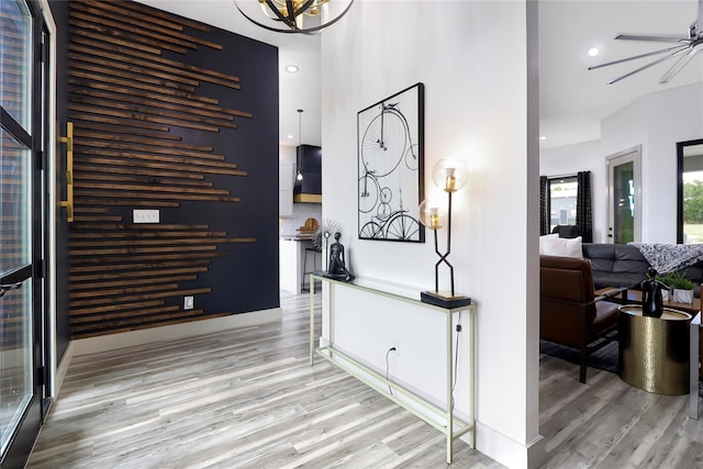 entryway featuring ceiling fan and light wood-type flooring