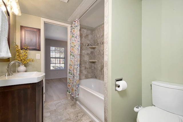 full bathroom featuring vanity, toilet, and shower / bath combo with shower curtain