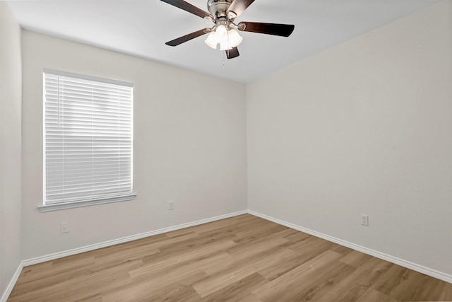 unfurnished room featuring light hardwood / wood-style floors and ceiling fan