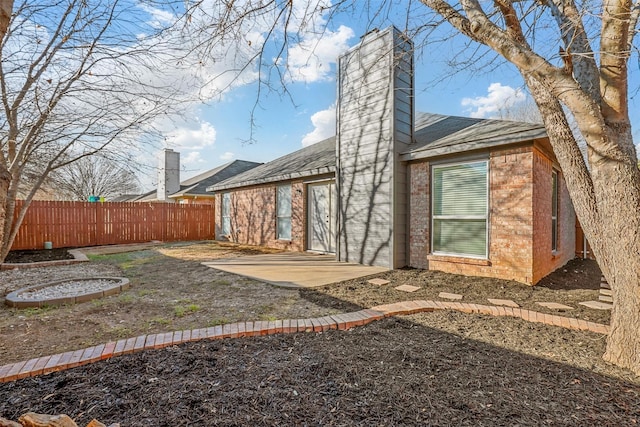 rear view of house with a patio