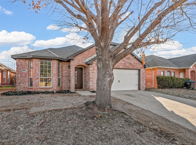 single story home featuring a garage