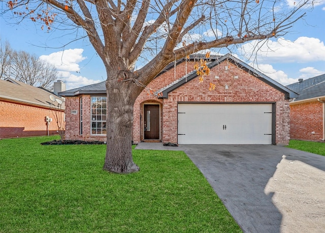 view of front of property with a garage and a front lawn