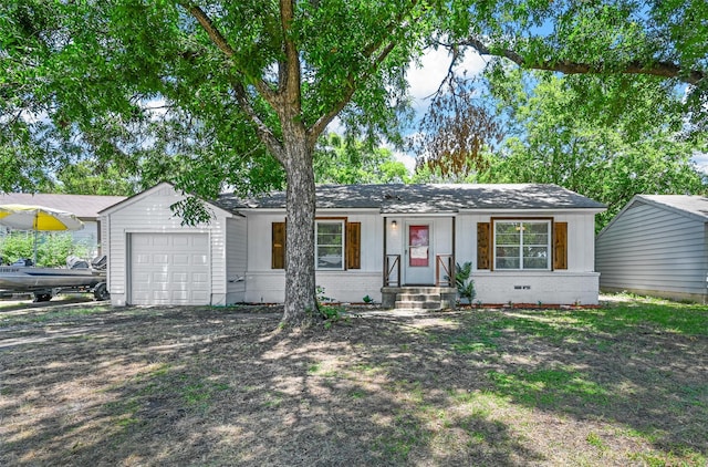 ranch-style home with a garage