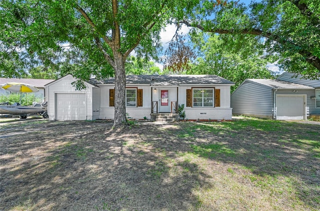 single story home featuring a garage