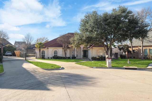 view of front of home with a front lawn