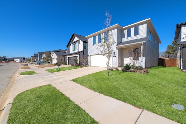 view of front facade with a garage and a front yard