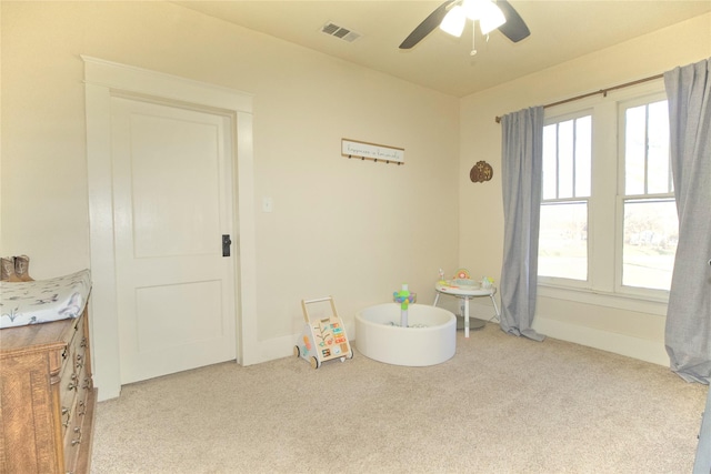 game room featuring ceiling fan and carpet floors