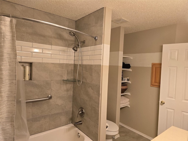 bathroom featuring toilet, a textured ceiling, tile patterned flooring, and shower / bathtub combination with curtain