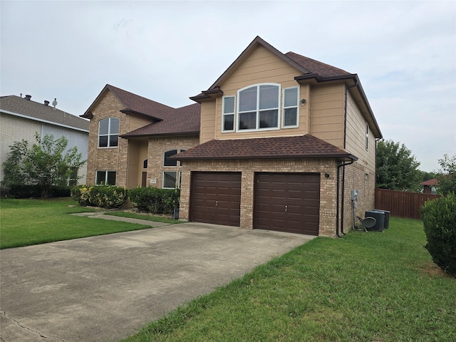 view of front property with a front yard, central AC, and a garage