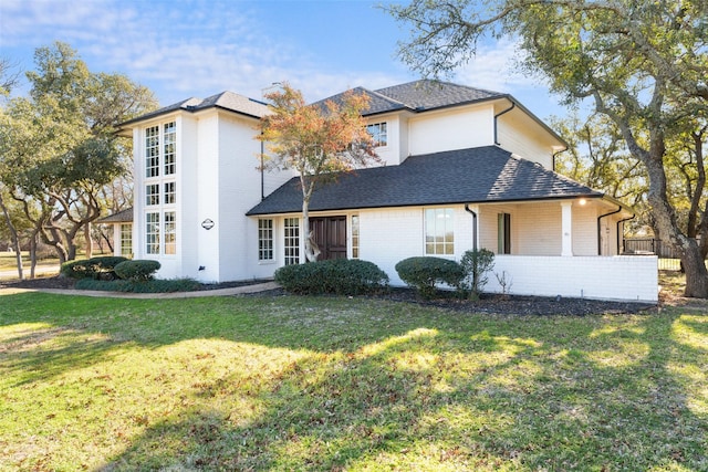 view of front of home with a front yard