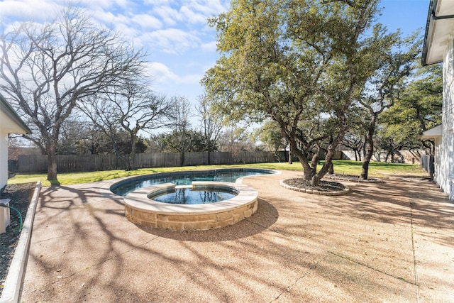 view of swimming pool featuring an in ground hot tub