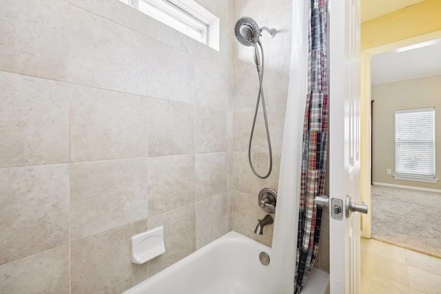 bathroom with shower / bath combination with curtain