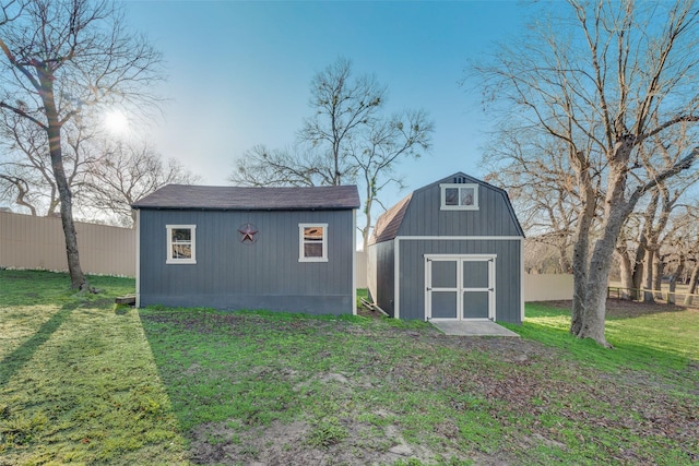 view of outdoor structure with a lawn