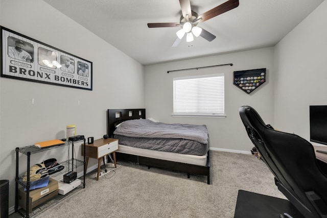 bedroom with ceiling fan and carpet floors