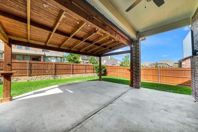 view of patio featuring ceiling fan