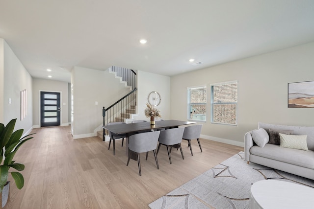 dining room featuring light wood-type flooring