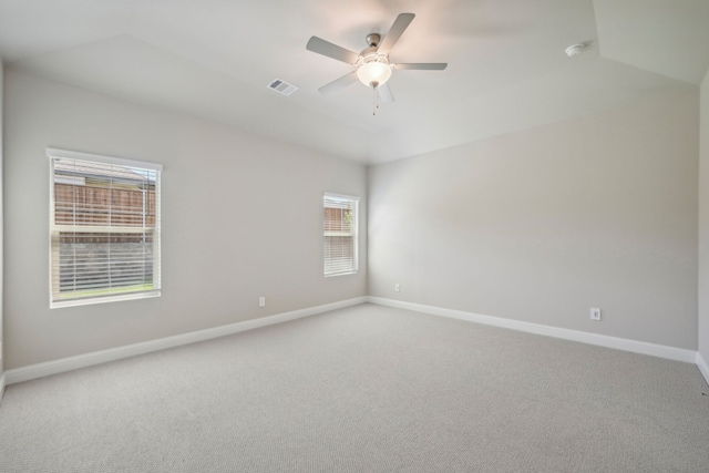 spare room with carpet floors and ceiling fan