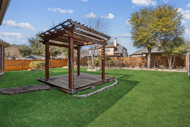 view of yard featuring a wooden deck and a pergola