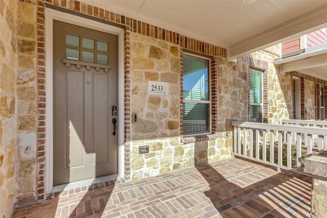 property entrance with a porch