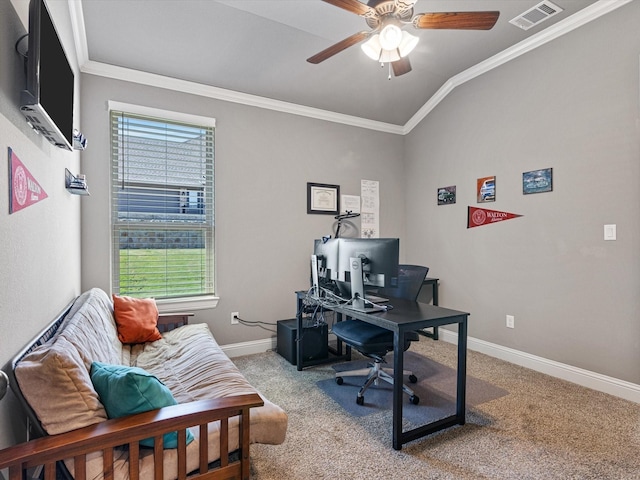 carpeted office with ceiling fan, a wealth of natural light, ornamental molding, and lofted ceiling