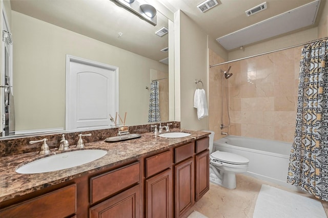 full bathroom with tile patterned floors, vanity, toilet, and shower / tub combo with curtain