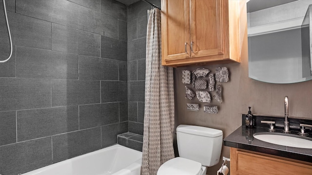 full bathroom featuring vanity, toilet, and shower / bath combo with shower curtain