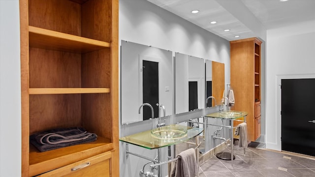 bathroom featuring vanity and tile patterned flooring