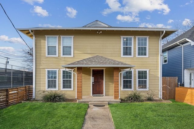 view of front facade with a front lawn