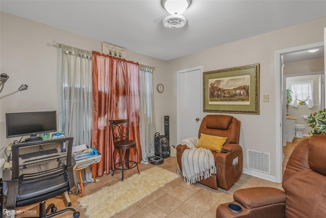 interior space with light tile patterned floors