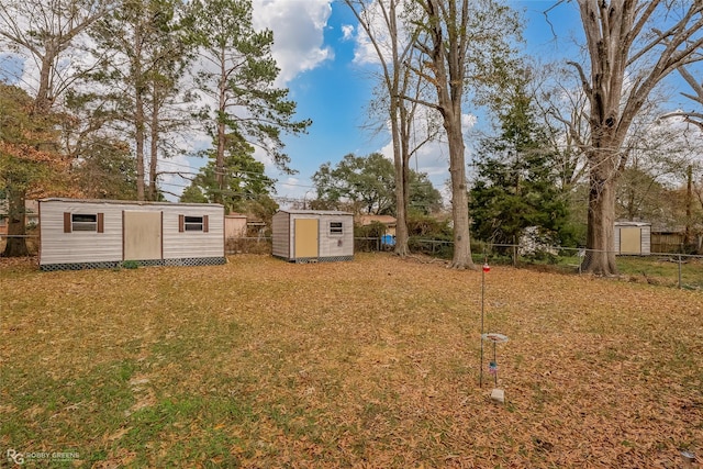 view of yard with a storage shed