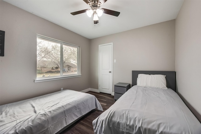 bedroom featuring dark wood-type flooring and ceiling fan