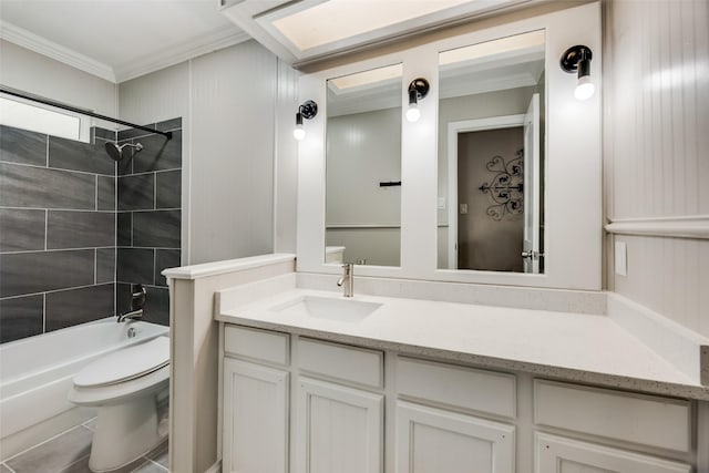 full bathroom with toilet, vanity, crown molding, and tiled shower / bath