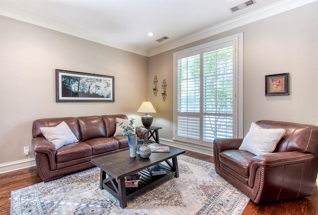 living room with crown molding and dark hardwood / wood-style floors