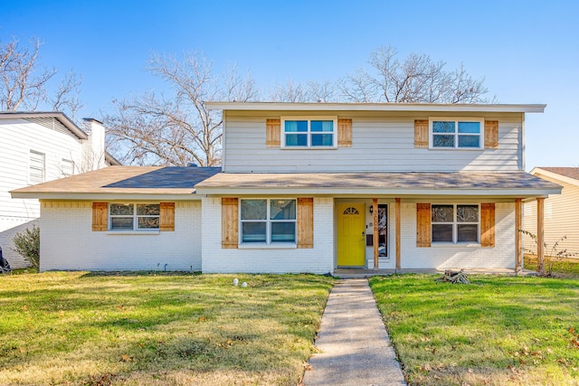 view of front of property with a porch and a front yard