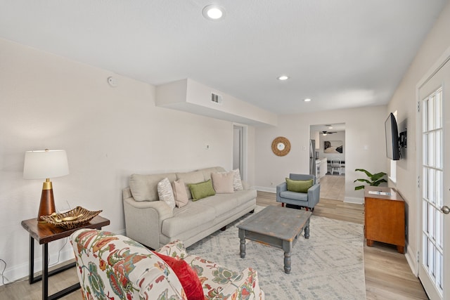 living room with light wood-type flooring