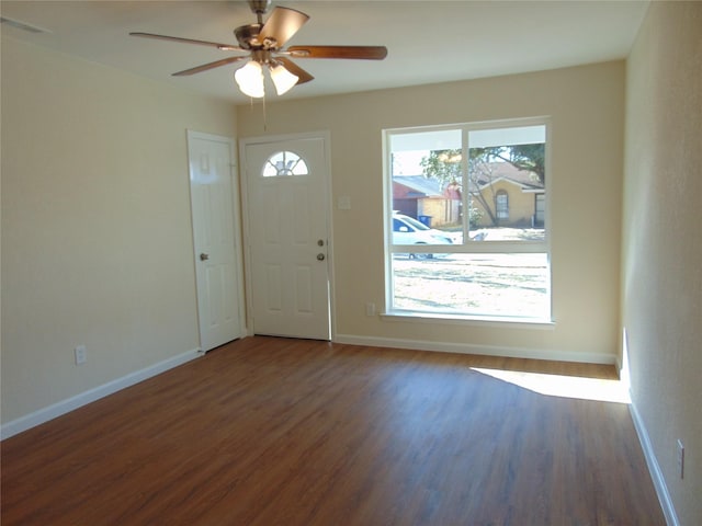 entrance foyer with ceiling fan and dark hardwood / wood-style flooring